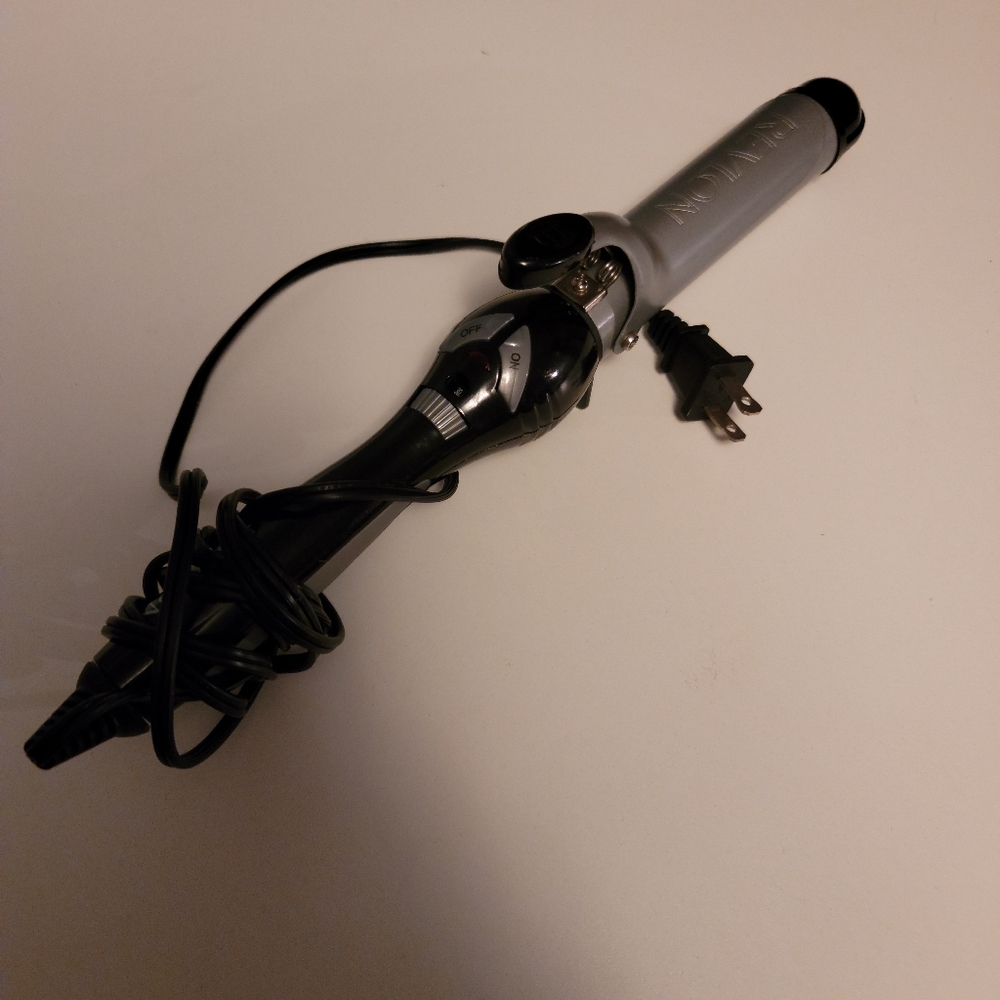 Revlon 1.5 inch barrel curling iron. Used once